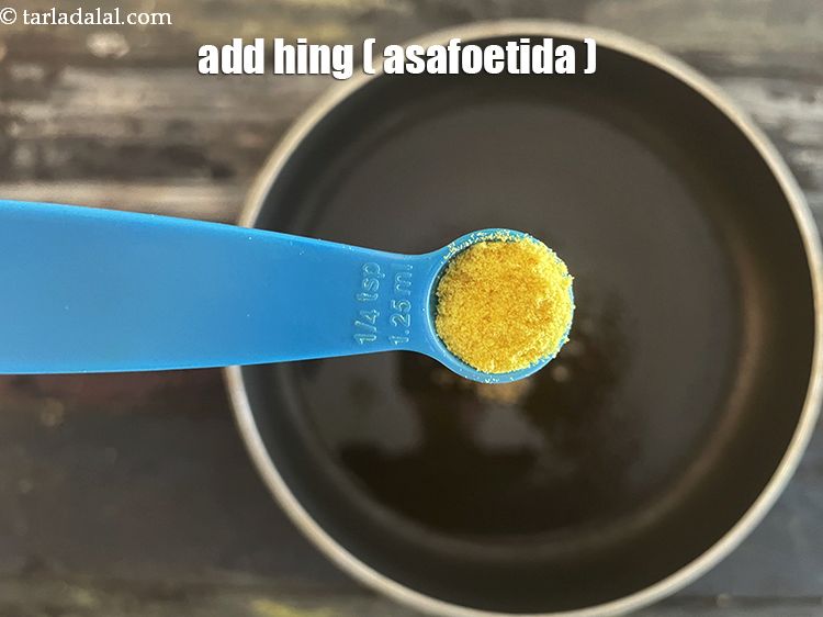 Step 17 – Add&nbsp;<meta charset="UTF-8" />1/4 tsp&nbsp;<a href="glossary-asafoetida-hing-113i">asafoetida (hing)</a>.