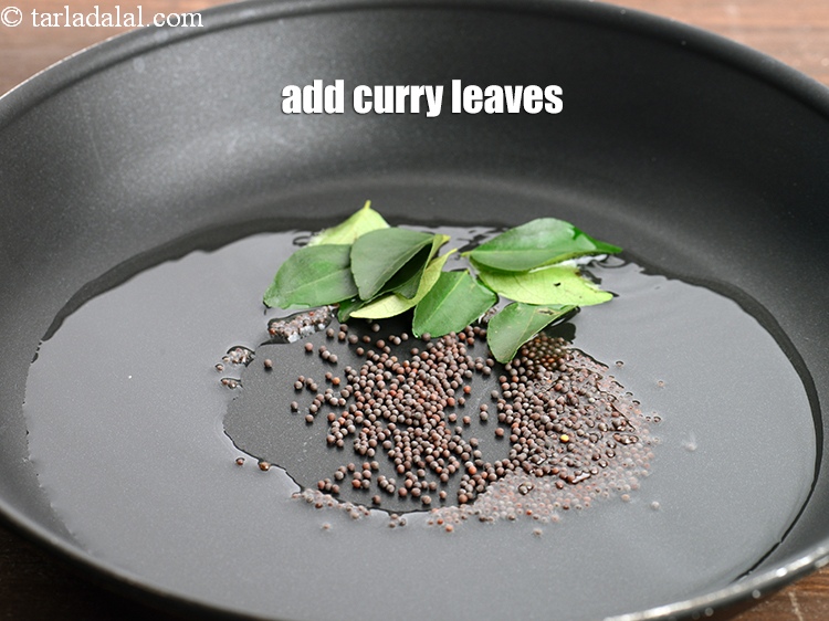 Step 7 – Add 6 <a href="https://www.tarladalal.com/glossary-curry-leaves-kadi-patta-kadipatta-388i">curry leaves (kadi patta)</a>.&nbsp;