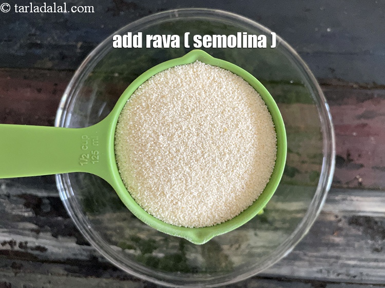 Step 7 – Add&nbsp;<meta charset="UTF-8" />1/2 cup&nbsp;<a href="glossary-semolina-sooji-rava-rawa-603i">semolina (rava)</a>.