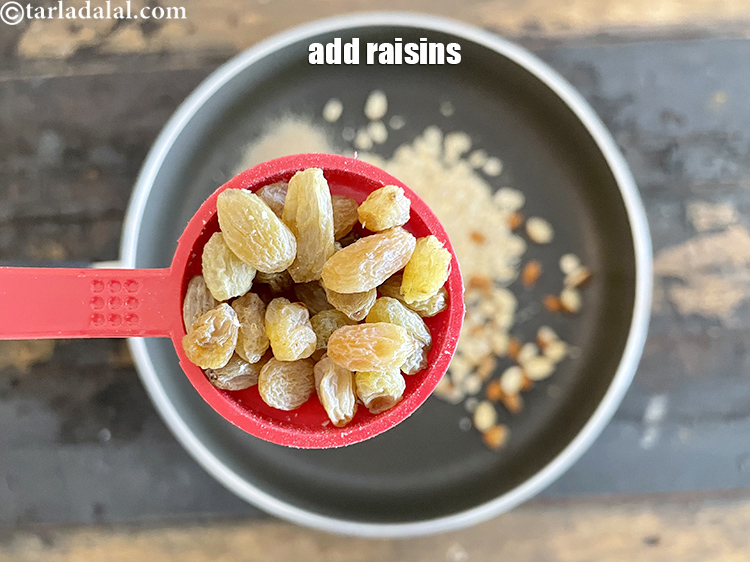 Step 26 – Add&nbsp;<meta charset="UTF-8" />2 tbsp&nbsp;<a href="glossary-raisins-kishmish-kismis-597i">raisins (kismis)</a>.
