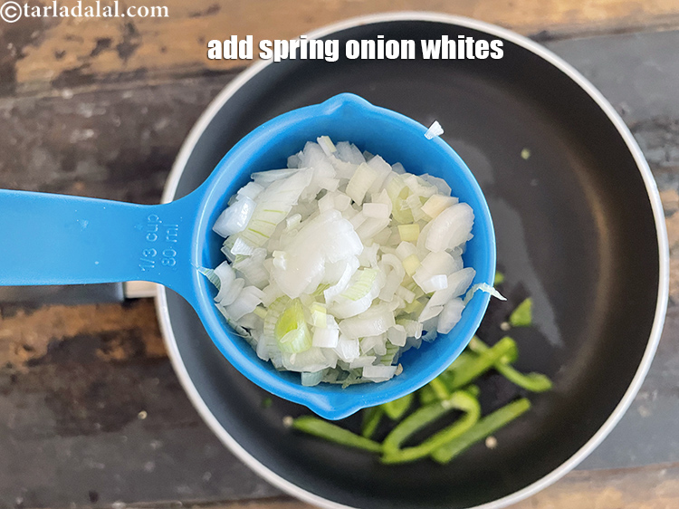 Step 13 – Add&nbsp;<meta charset="UTF-8" />1/4 cup&nbsp;finely&nbsp;<a href="glossary-chopped-spring-onion-whites-815i">chopped spring onions whites</a>.