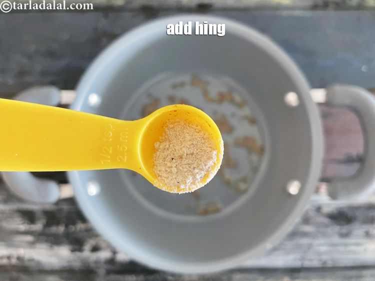 Step 17 – Add&nbsp;<meta charset="UTF-8" />1/4 tsp&nbsp;<a href="glossary-asafoetida-hing-113i">asafoetida (hing)</a>.