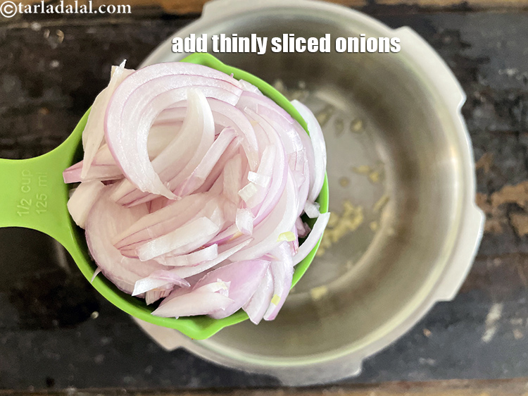 Step 13 – Add&nbsp;<meta charset="UTF-8" />1/2 cup&nbsp;thinly&nbsp;<a href="glossary-sliced-onions-745i">sliced onions</a>.