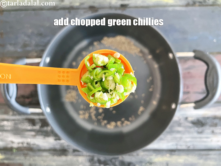 Step 17 – Add&nbsp;<meta charset="UTF-8" />1 tsp&nbsp;finely&nbsp;<a href="glossary-chopped-green-chilli-820i">chopped green chillies</a>.