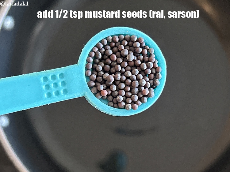 Step 7 – Add&nbsp;<meta charset="UTF-8" />1/2 tsp&nbsp;<a href="glossary-mustard-seeds-sarson-rai-sarson-ke-beej-525i">mustard seeds ( rai / sarson)</a>.