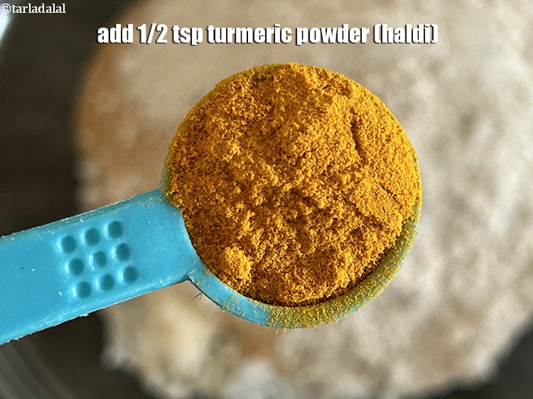 Step 10 – Add&nbsp;<meta charset="UTF-8" />1/2 tsp&nbsp;<a href="glossary-turmeric-powder-haldi-645i">turmeric powder (haldi)</a>.