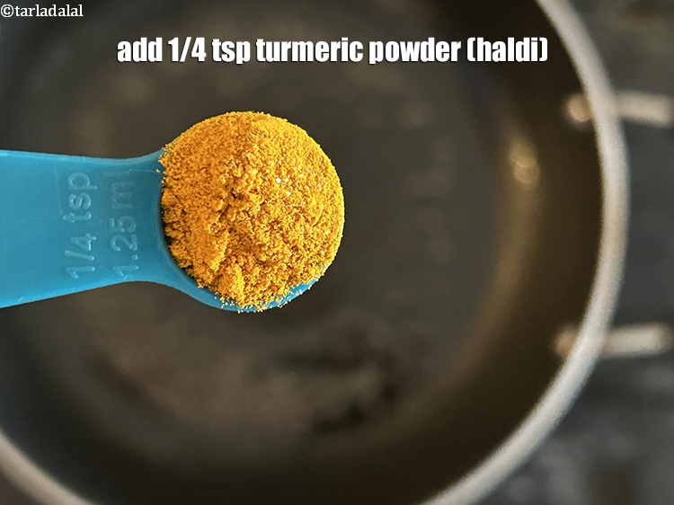 Step 7 – Add&nbsp;<meta charset="UTF-8" />1/4 tsp&nbsp;<a href="glossary-turmeric-powder-haldi-645i">turmeric powder (haldi)</a>.