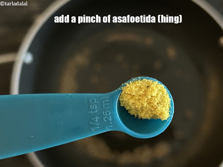 Step 8 – Add&nbsp;<meta charset="UTF-8" />a pinch of&nbsp;<a href="glossary-asafoetida-hing-113i">asafoetida (hing)</a>.