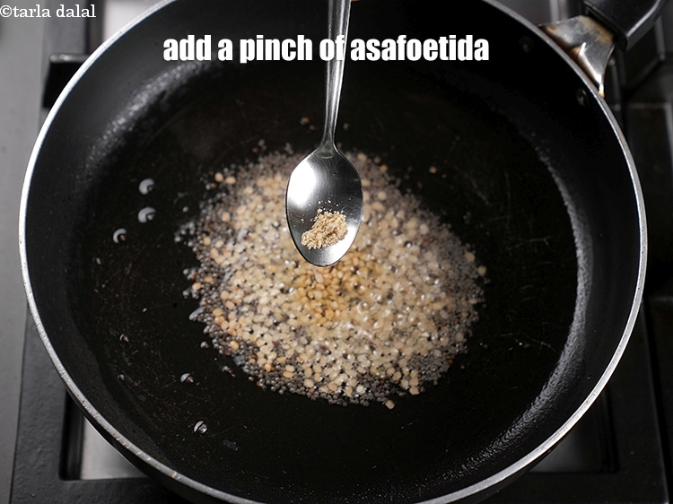 Step 11 – Add a pinch of asafoetida.&nbsp;