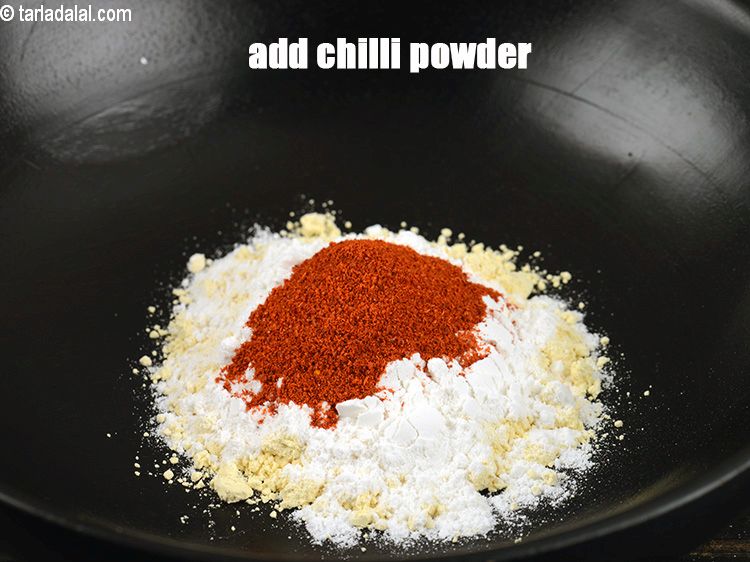 Step 33 – Add 1 tsp <a href="https://www.tarladalal.com/glossary-chilli-powder-red-chilli-powder-339i">chilli powder</a>.