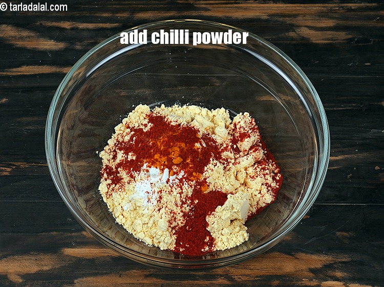 Step 7 – Add 1&frac14; tsp <a href="https://www.tarladalal.com/glossary-chilli-powder-red-chilli-powder-339i">chilli powder</a>.