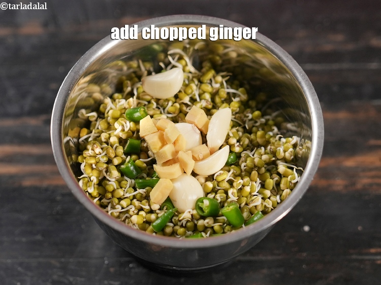 Step 6 – Add 1 tsp <a href="https://www.tarladalal.com/glossary-chopped-ginger-786i">chopped ginger (adrak)</a>.