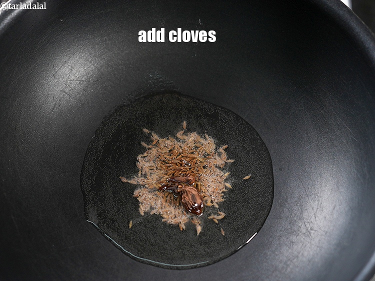 Step 6 – Add 2 cloves.