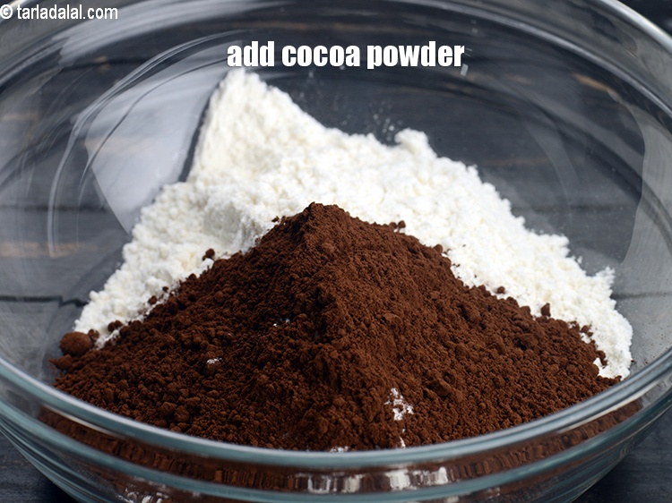 Step 6 – Add 3 tbsp <a href="https://www.tarladalal.com/glossary-cocoa-powder-284i">cocoa powder</a>.