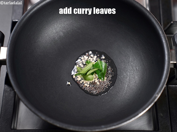 Step 6 – Add 5 to 6 curry leaves.