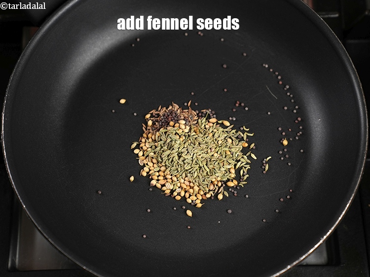 Step 6 – Add &frac12; tsp&nbsp;<a href="https://www.tarladalal.com/glossary-fennel-seeds-saunf-sauf-410i">fennel seeds (saunf)</a>.