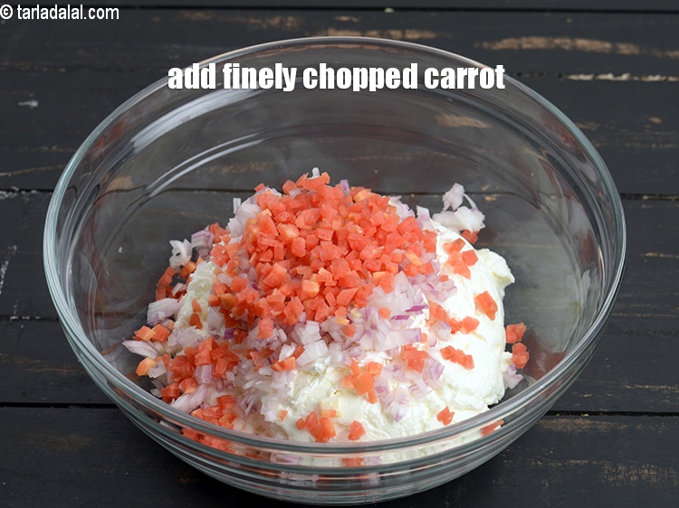 Step 6 – Add 2 tbsp finely chopped <a href="https://www.tarladalal.com/glossary-carrot-gajar-gajjar-253i">carrot</a>.