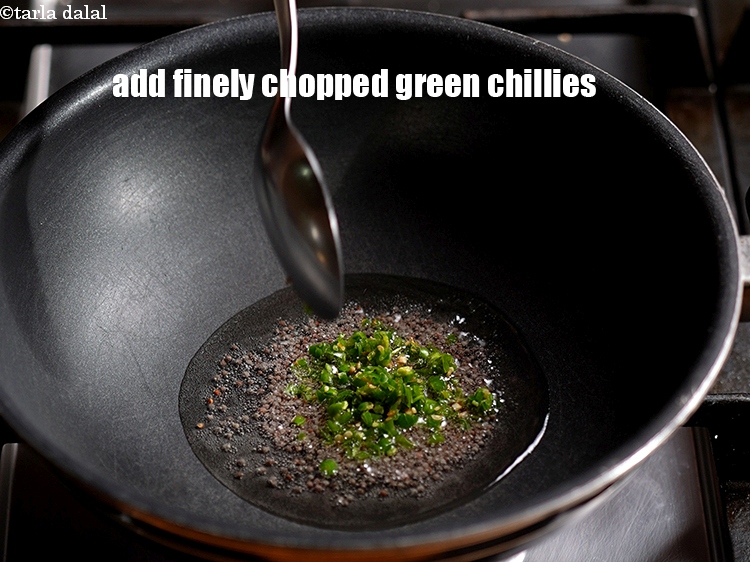 Step 6 – Add 2 tsp finely&nbsp;<a href="https://www.tarladalal.com/glossary-chopped-green-chilli-820i">chopped green chillies</a>.