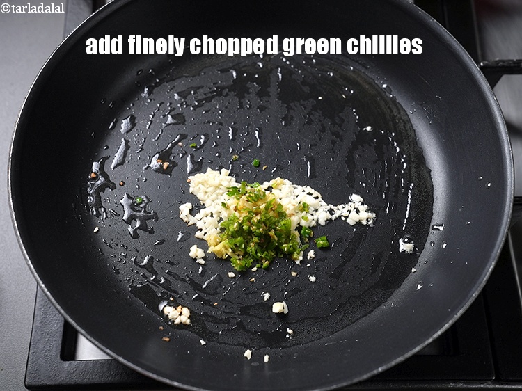 Step 6 – Add 1 tsp finely <a href="https://www.tarladalal.com/glossary-chopped-green-chilli-820i">chopped green chillies</a>.&nbsp;
