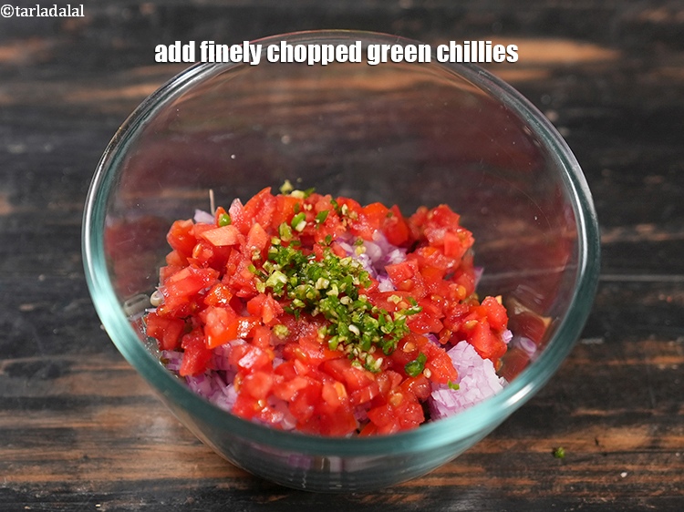 Step 6 – Add 1 tsp finely <a href="https://www.tarladalal.com/glossary-chopped-green-chilli-820i">chopped green chillies</a>.&nbsp;