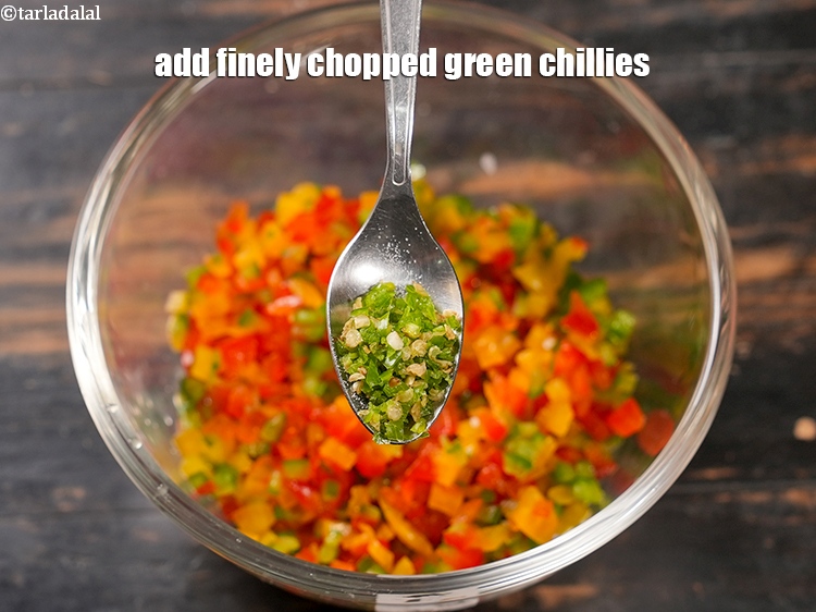 Step 6 – Add &frac12; tsp finely <a href="https://www.tarladalal.com/glossary-chopped-green-chilli-820i">chopped green chillies</a>.