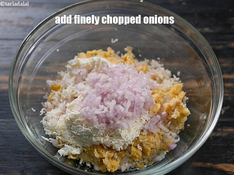 Step 6 – Add &frac14; cup finely&nbsp;<a href="https://www.tarladalal.com/glossary-chopped-onions-722i">chopped onions</a>.