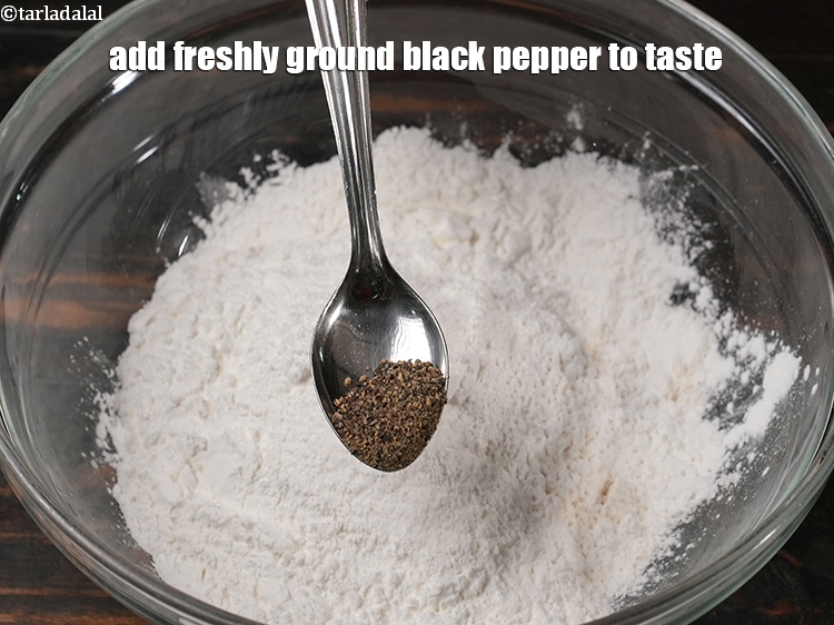 Step 6 – Add &nbsp;<a href="https://www.tarladalal.com/glossary-freshly-ground-black-pepper-kalimirch-powder-kali-mirch-ka-powder-567i">freshly ground black pepper (kalimirch)</a>&nbsp;to taste.