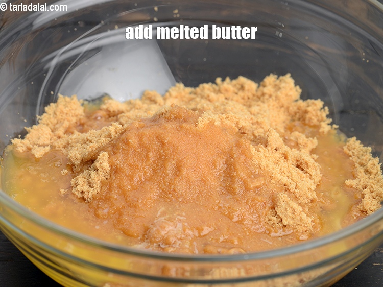 Step 6 – Add &frac14; cup <a href="https://www.tarladalal.com/glossary-melted-butter-1941i">melted butter</a>.