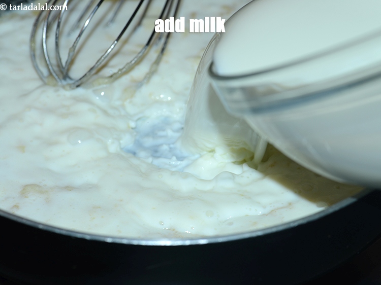 Step 6 – Add 2 &frac14; cups of milk.