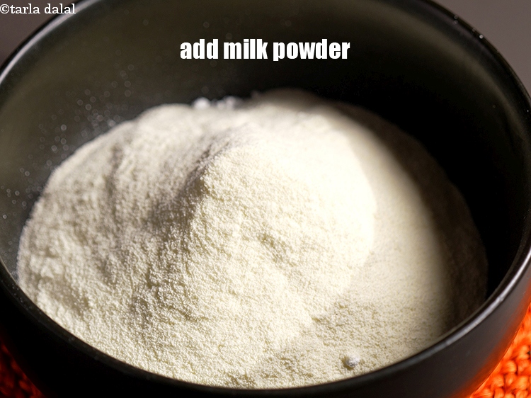 Step 6 – Add &frac34; cup <a href="https://www.tarladalal.com/glossary-milk-powder-517i">milk powder</a>.