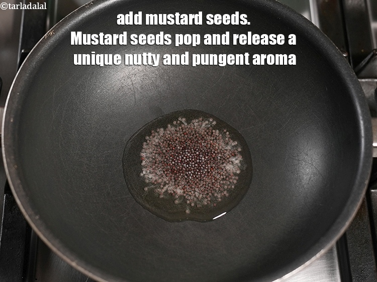 Step 9 – Add 1 tsp <a href="https://www.tarladalal.com/glossary-mustard-seeds-sarson-rai-sarson-ke-beej-525i">mustard seeds ( rai / sarson)</a>. Mustard seeds pop and release …