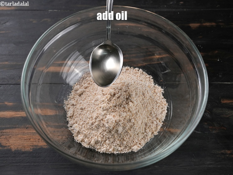 Step 6 – Add 1 tsp oil in a bowl.