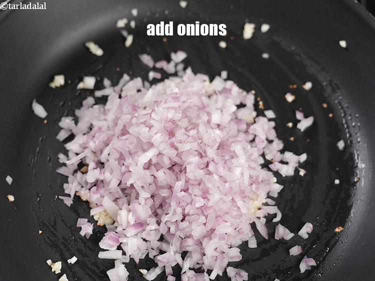 Step 8 – Add 1 cup finely&nbsp;<a href="https://www.tarladalal.com/glossary-chopped-onions-722i">chopped onions</a>.