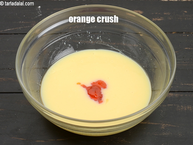 Step 7 – Add 1 tbsp <a href="https://www.tarladalal.com/glossary-orange-crush-santre-ka-crush-1987i">orange crush</a>.
