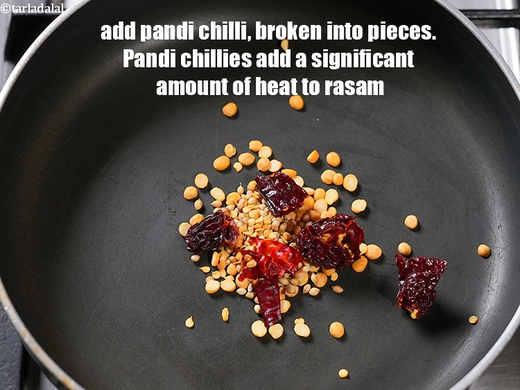 स्टेप 6 – १&nbsp;<a href=""https://www.tarladalal.com/glossary-pandi-chillies-pandi-dry-red-chillies-hindi-2373i"">पंडी मिर्च</a>&nbsp;, टुकड़ों में टूटी हुई डालें ।&nbsp;पंडी मिर्च …