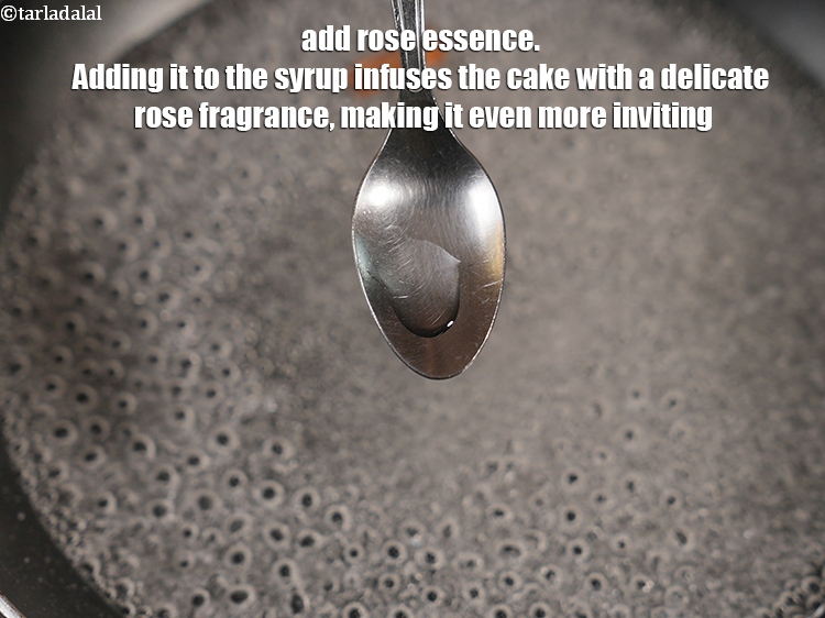 स्टेप 6 – २&nbsp;बूँदें&nbsp;<a href=""https://www.tarladalal.com/glossary-rose-essence-hindi-408i"">गुलाब एसेंस</a>&nbsp;डालें: इसे सिरप में मिलाने से केक में …