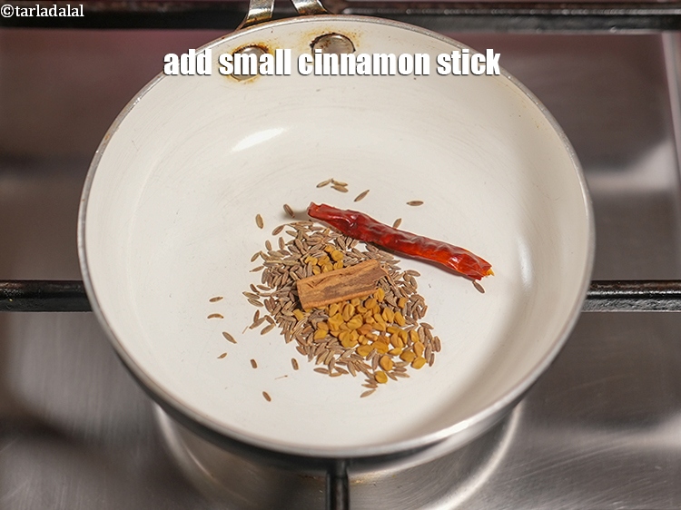 Step 6 – Add 1 small <a href="https://www.tarladalal.com/glossary-cinnamon-dalchini-346i">cinnamon (dalchini)</a>&nbsp;stick.