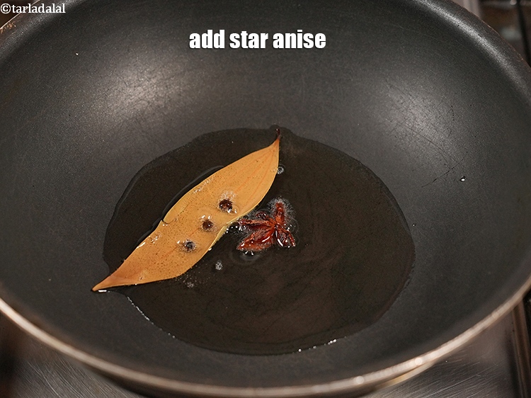 Step 6 – Add 1 <a href="https://www.tarladalal.com/glossary-star-anise-chakri-phool-623i">star anise (chakri phool)</a>.