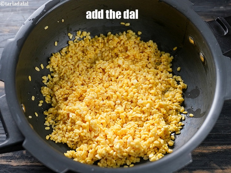 Step 6 – In a pressure cooker, add the dal.