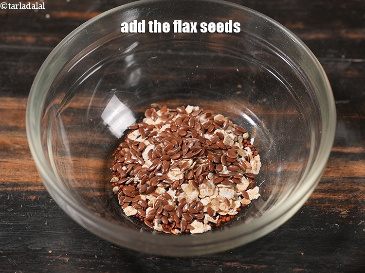 Step 5 – Add the <a href="https://www.tarladalal.com/glossary-flax-seeds-1598i" target="_blank">flax seeds</a>. If you have then also add <a href="https://www.tarladalal.com/glossary-melon-seeds-77i" target="_blank">melon …