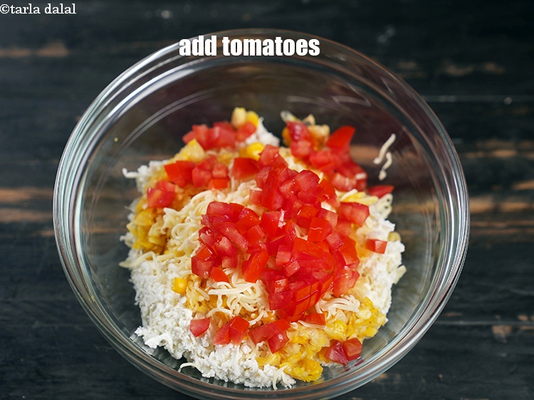 Step 6 – Add 1/4 cup deseeded and <a href="https://www.tarladalal.com/glossary-chopped-tomatoes-779i">chopped tomatoes</a>.