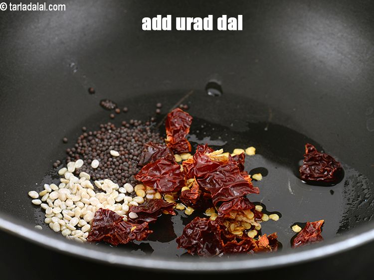 Step 25 – Add&nbsp;1/2 tsp&nbsp;<a href="https://www.tarladalal.com/glossary-urad-dal-split-black-lentil-941i">urad dal (split black lentils)</a>.