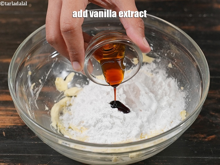 Step 6 – Add &frac12; tsp <a href="https://www.tarladalal.com/glossary-vanilla-extract-1248i">vanilla extract</a>.