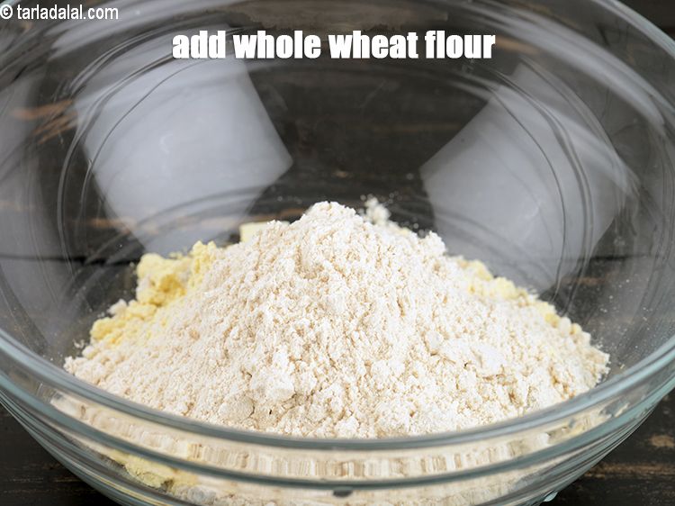 Step 6 – Add 1/4 cup <a href="https://www.tarladalal.com/glossary-whole-wheat-flour-gehun-ka-atta-gehun-ka-aata-429i">whole wheat flour (gehun ka atta)</a>.