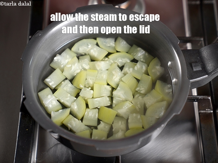 Step 6 – Allow the steam to escape and then open the lid.