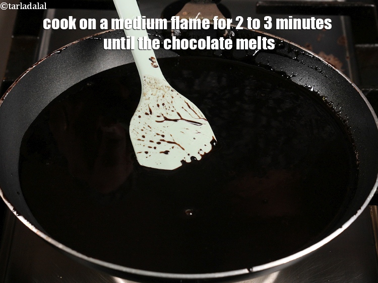 Step 6 – Cook on a medium flame for 2 to 3 minutes until the chocolate melts, while …