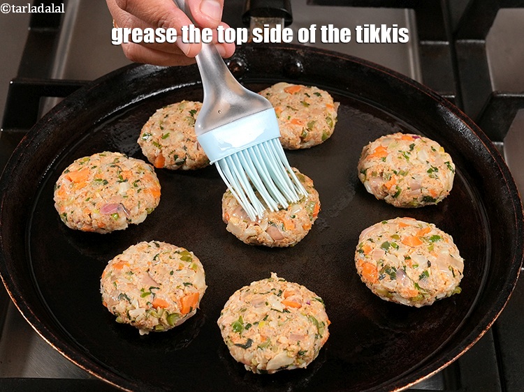 Step 38 – Grease the top side of the tikkis.