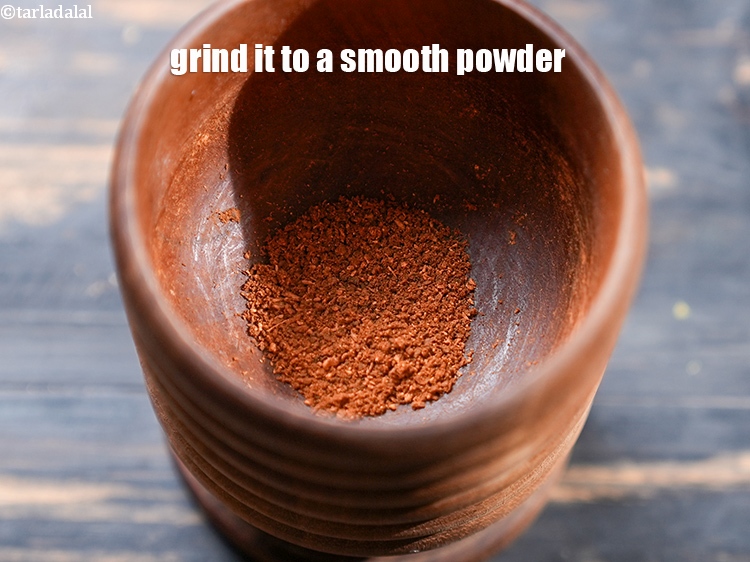 Step 6 – Cool and grind it using a mortar-pestle (khalbatta) to a smooth powder. Keep aside.