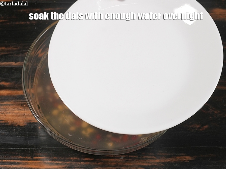 Step 6 – <p>Clean, wash and soak the dals with enough water overnight.</p>