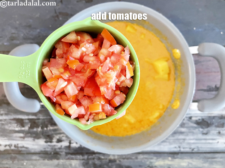 Step 40 – <meta charset="UTF-8" /> Add 1/2 cup chopped tomatoes.